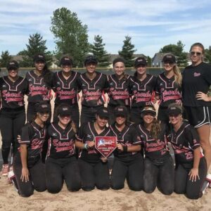 Softball team posing with championship plaque